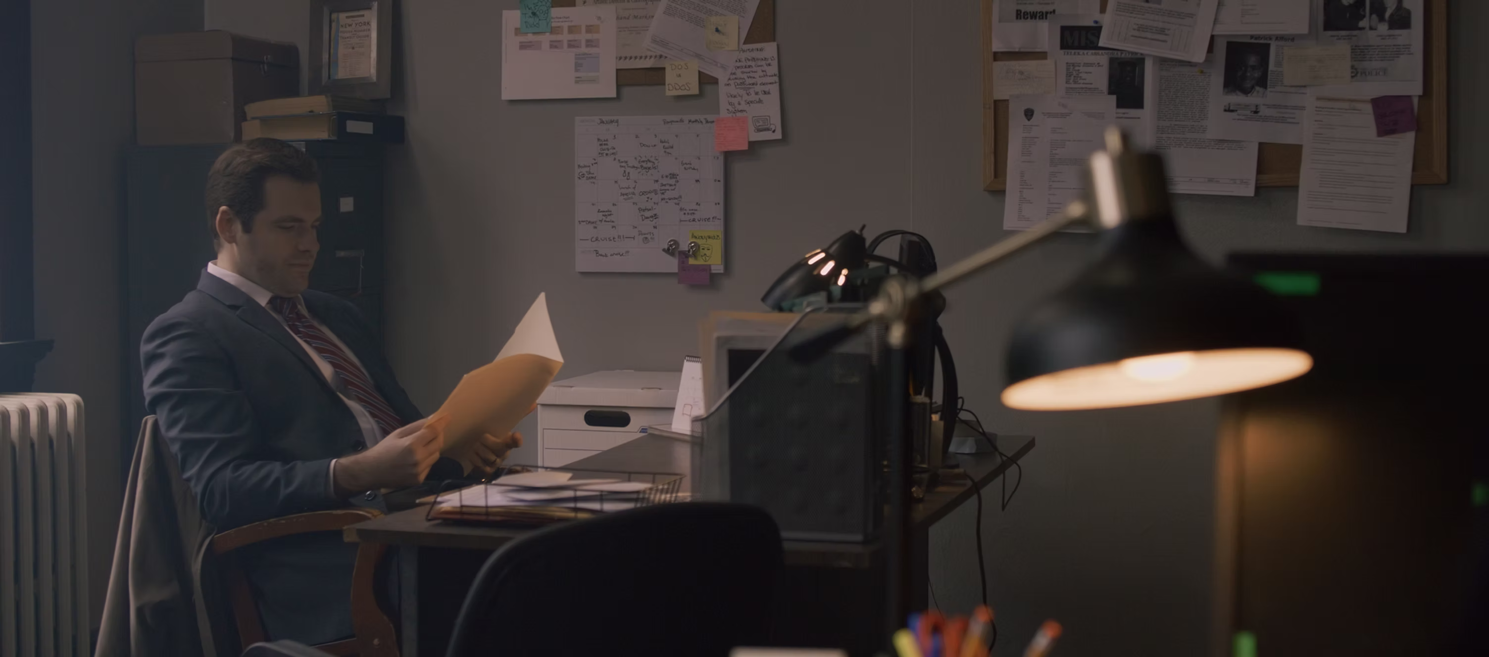 777 Raw Street slide featuring a man at a desk
